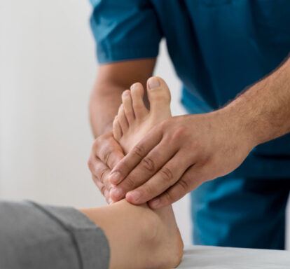 patient getting treatment by podiatrist